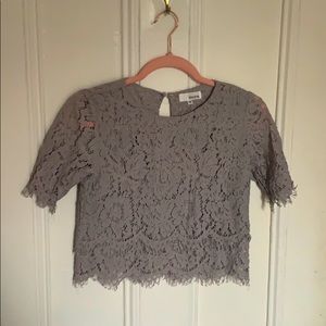 Pastel purple laced crop top.